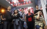 The tension of yesterday’s local elections in Taiwan shows on the faces of supporters of the Democratic Progressive Party as they watch results roll in. Photo: AP
