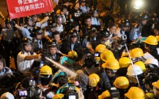 Police clash with protesters in Tamar. Some legislators are accused of letting activist leaders work in their offices. Photo: Edward Wong