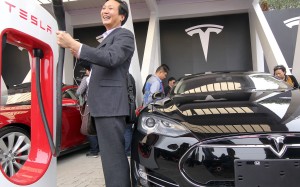 A Tesla "supercharger" in Shanghai pictured on the day of its opening in April 2014. The lack of infrastructure for all electric vehicles is seen as one of the barriers for their greater acceptance in the mainland market. Photo: AFP