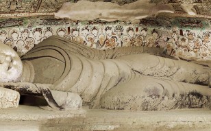 A reclining Buddha In Nirvana in Dunhuang Caves, Gansu province.