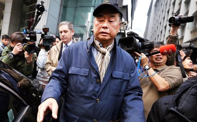 Media tycoon Jimmy Lai leaves police headquarters in Wan Chai yesterday morning after being arrested but not charged at a pre-scheduled meeting. Photo: Sam Tsang