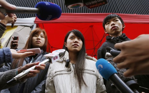 Isabella Lo (left), Prince Wong and Joshua Wong speak to the media yesterday. Photo: Reuters