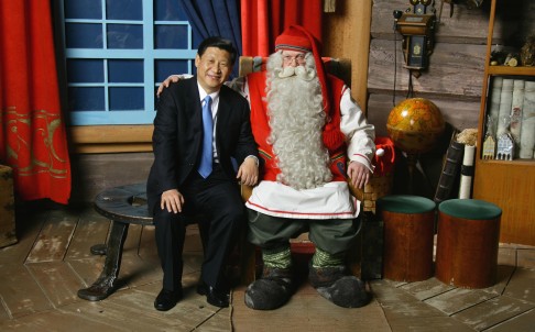 Xi Jinping, who made a three-day visit to Finland as vice-president in 2010, meets Santa Claus during a trip to Rovaniemi on the Arctic Circle. Photo: SCMP