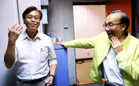 Democrat Nelson Wong (left) and Alan Leong, of the Civic Party, at RTHK yesterday. The two have engaged in a rare open war of words over the petition. Photo: Sam Tsang

