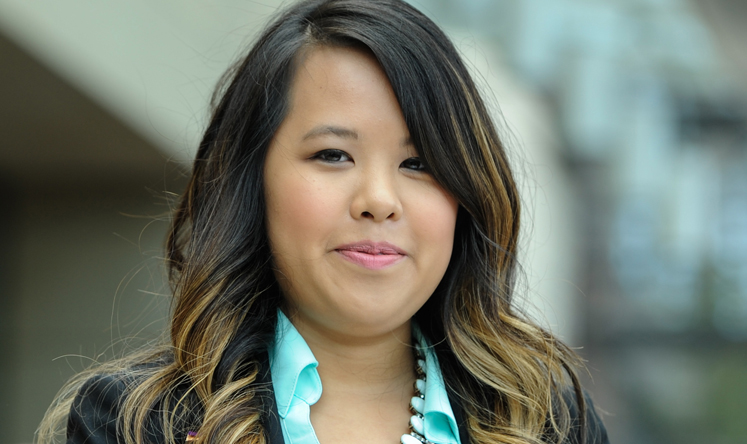 Nina Pham walked out of a Washington-area hospital virus-free and into the open arms of Obama in the Oval Office at the White House on Friday. - nina_pham_speak_xinhua