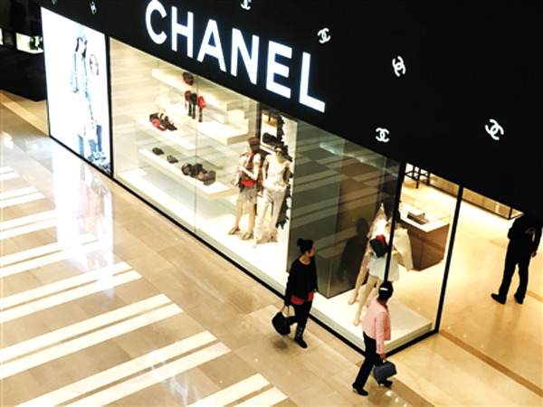 Chanel began cutting prices on Thursday on the mainland and in Hong ...