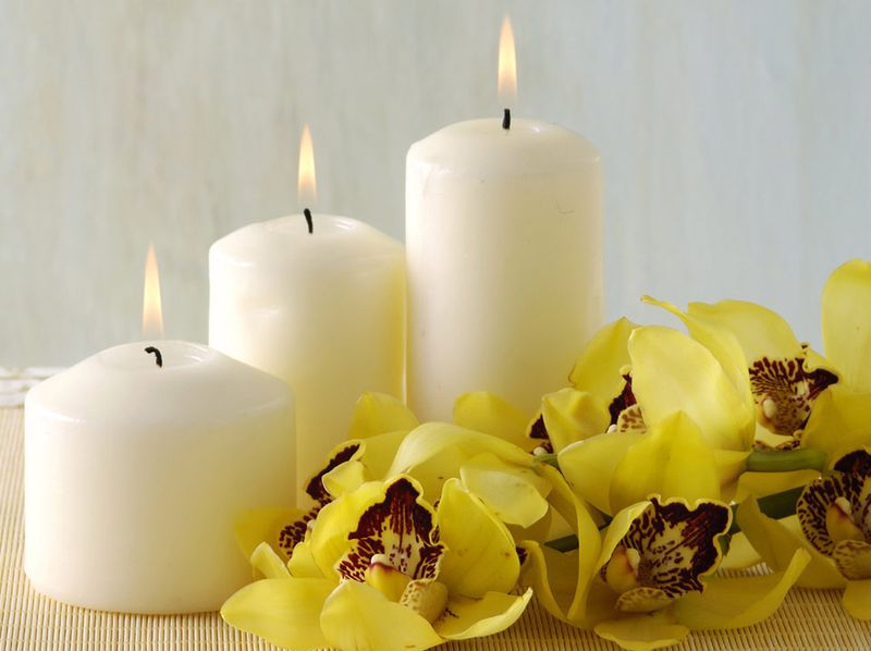 Candles and flowers make a winning combination for your house party.