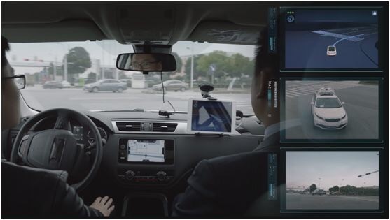 Video shows company CTO Bob Zhang (right) sitting inside an autonomous vehicle. (Source: Didi Chuxing)