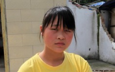 Xia Chunrong, 20, lost her younger brother. Photo: Robert Ng