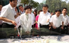 Chief Secretary Carrie Lam checks out a model of Chinese University's Shenzhen campus. Photo: ISD