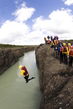 An invigorating cliff jump into an icy river. Photo: ellithor.com