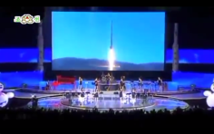 The Moranbong band seen performing at a concert to celebrate a successful rocket launch earlier this year. Screenshot from North Korean television