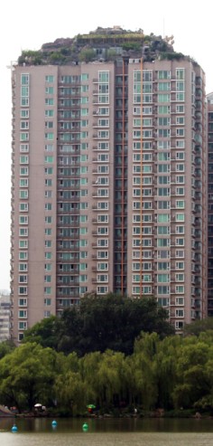 A view of the fake mountain and trees on top of the residential building in Beijing's upscale Park View estate. Photo: Simon Song