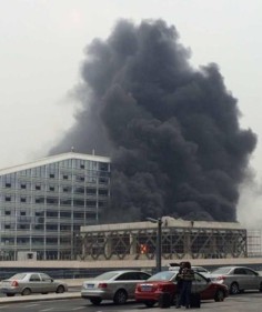 Smoke rises from the building. Photo: SCMP