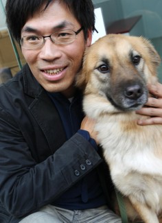 Mark Mak Chi-ho of Non-Profit making Veterinary Service Society, with a friend.