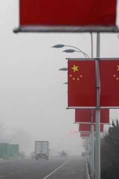 The smog in Tianjin, where some roads were closed. Photo: EPA