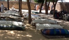 Bodies laid out for burial in the village of Konduga. Photo: AFP