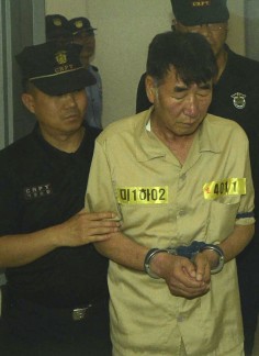 Lee Joon-seok, captain of sunken ferry Sewol, arrives at the court in Gwangju. Photo: Reuters