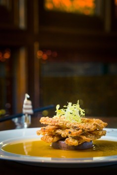 Deep-fried mushroom crackers with abalone sauce.