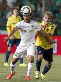 Omonia's Fylaktou Yerasimos (left) fights for the ball with Pukki Teemu of Brondly IF in a third qualifying round, second leg soccer match. Photo: AP