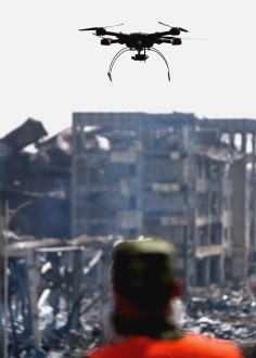  A rescuer using a drone detects the core blast site in Tianjin on Saturday. Photo: Xinhua