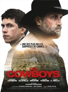 A poster promoting Les Cowboys. Its producer said the film’s release should go ahead because it was not about what happened in Paris.