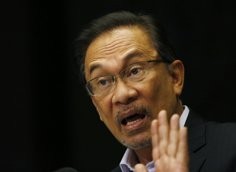 Anwar Ibrahim’s embrace of his foe’s mission signals that Mahathir Mahamd has reciprocated – in his support of Anwar’s reform agenda. Photo: Reuters