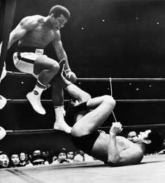 World heavyweight boxing champion Muhammad Ali is shown trying to evade kicks by wrestler Antonio Inoki during their 15-round World Martial Arts match, in Tokyo. Photo: AP