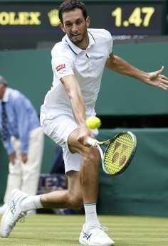 James Ward put up a brave showing but was no real match for top seed Novak Djokovic. Photo: Xinhua
