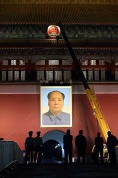 Chinese workers install a new portrait of Mao Zedong at Beijing’s Tiananmen rostrum, ahead of National Day on October 1. China’s post-Mao rulers have had two strategies of self-preservation: the purchase of legitimacy and the exercise of control. Photo: AFP