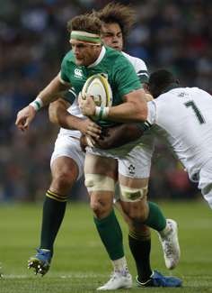 Ireland's Jamie Heaslip takes on his South Africa opponents in June this year. Photo: EPA