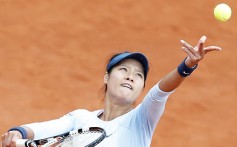 Na Li in action during her second round match against Bethanie Mattek-Sands of at the French Open tennis. Photo: EPA