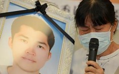 The mother of deceased soldier Hung Chung-chiu speaks out about her son's death. Photo: AFP 