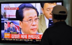 A South Korean man watches TV news about the alleged dismissal of Jang Song-thaek earlier this month. Photo: AFP
