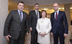 EU Foreign Policy chief Catherine Ashton with Ukrainian opposition leaders, Oleh Tyahnybok, (left), Arseniy Yatsenyuk, (right), and Vitali Klitschko, (second left), in Kiev on Tuesday. Photo: AP