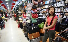 Fake handbags on sale at the Silk Market in Beijing. Photo: AFP