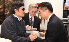 Chen Guangcheng, (left), with Gary Locke in Beijing in May 2012. Photo: AP