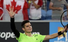 Milos Raonic of Canada is jubilant after beating Donald Young of the US. Photo: EPA