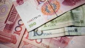 The spot yuan firmed to 6.8607 per US dollar in Shanghai on Monday at 4.25am, a 0.09 per cent rise from Friday.Photo: AFP