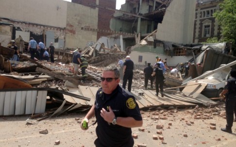 Emergency workers respond to a building collapse on the edge of Philadelphia. Photo: AP