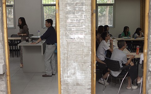 A class on literature and law (left), and students (right) are in a geology class. Photo: AP