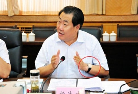 Yang Dacai wearing one of his watches. Photo: Xinhua