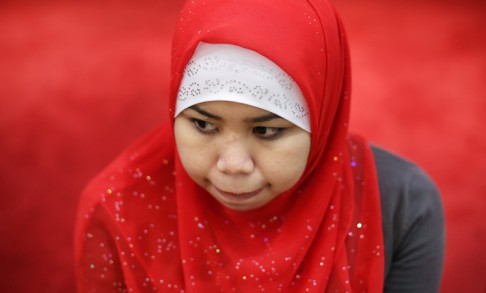 Kartika speaks to the media for the first time after her abusers were convicted. Photo: Sam Tsang