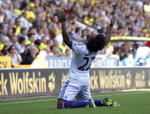 Chelsea's Brazilian midfielder Willian celebrates scoring his team's third goal. Photo: AFP