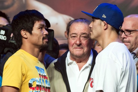 Pacquiao of Philippines and Rios of U.S. face-off during official weigh-in ahead of their fight at Venetian Macao hotel in Macau. Photo: Reuters