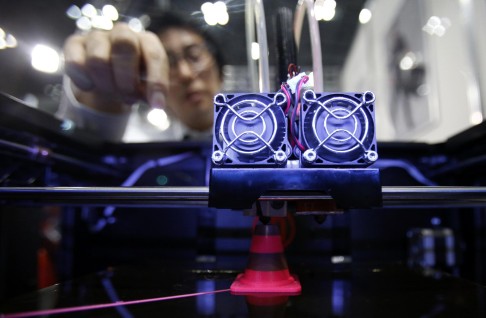 Nihon Binary's MakerBot Replicator 2X printer can print 3-D models and 3-D replicas in a bio-plastic made from corn. Photo: Reuters