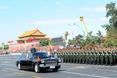 President Hu Jintao reviews troops from a Hongqi limousine, the brand used by his predecessors Jiang Zemin in 1999, Deng Xiaoping in 1984 and Mao Zedong. Photo: Xinhua