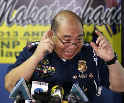 Philippine National Police Senior Superintendent Gilbert Sosa stresses a point during a news conference. Photo: AP