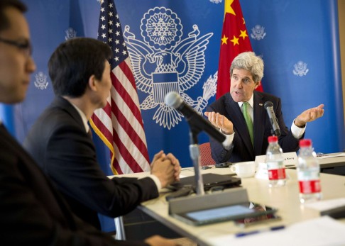 U.S. Secretary of State John Kerry gestures during a discussion with Chinese bloggers in Beijing. Photo: Reuters
