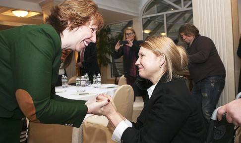 European Union foreign policy chief Catherine Ashton greets Ukrainian opposition leader Tymoshenko at a meeting in Kiev. Photo: Reuters